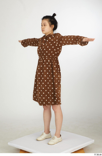 Aera brown dots dress casual dressed standing t poses white…